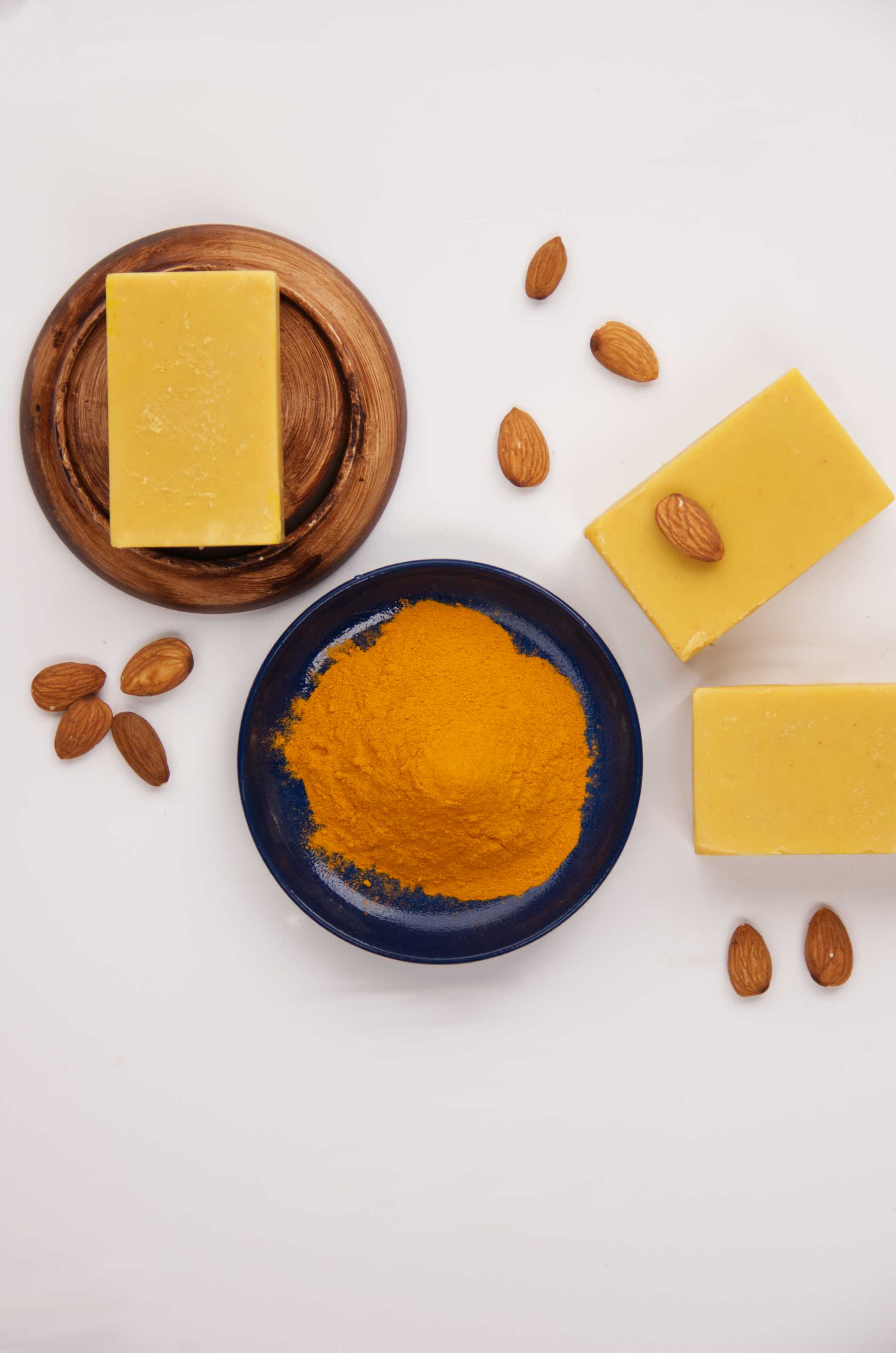 morka face soap, hand made, all natural, orange soap surrounded by almonds and turmeric.